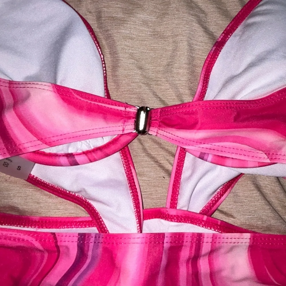 NWOT women’s one piece swimsuit/w hip wrap
